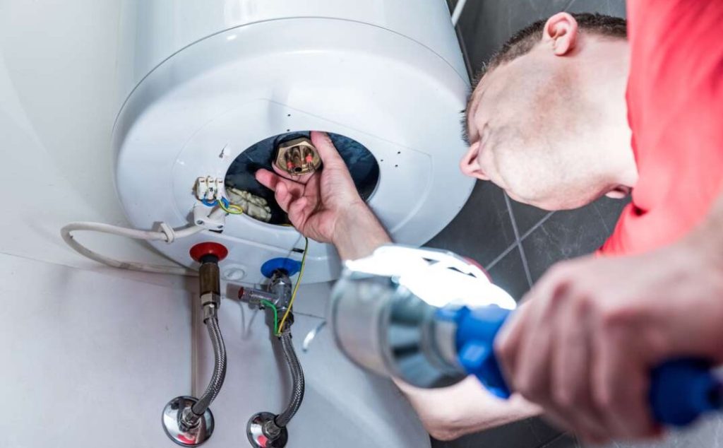 Expert plumbers providing residential water heater repair services